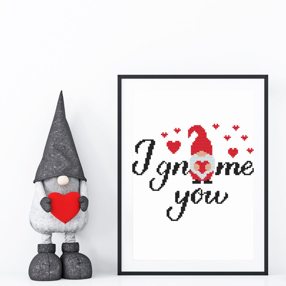 A cross stitch pattern featuring cute love gnome